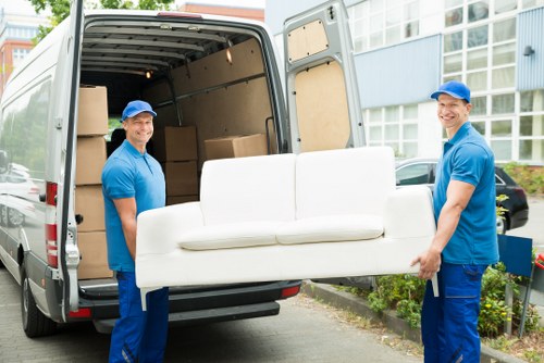 Man and van loading items in a Notting Hill residential street