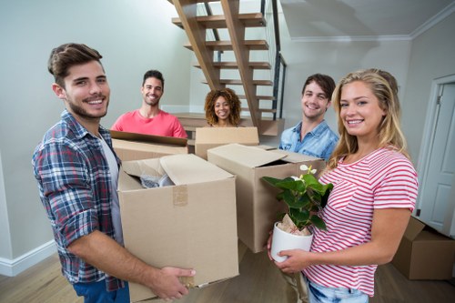 House removals team planning a move in a Notting Hill street