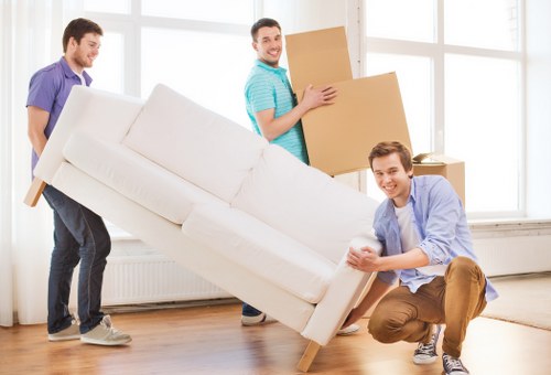 Local removals vehicle loading household items near Notting Hill