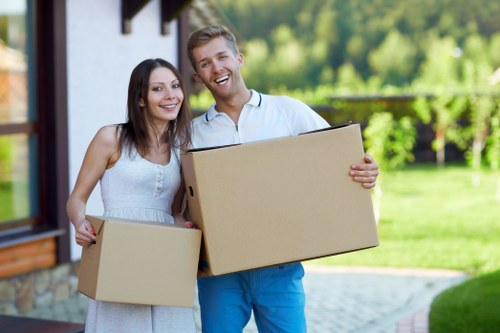 Packed boxes and furniture ready for a house move in Notting Hill